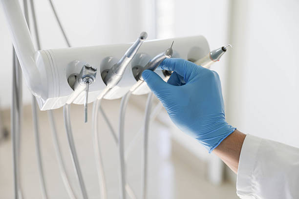 Professional Tooth Extraction technician working in Westhampton Beach, NY